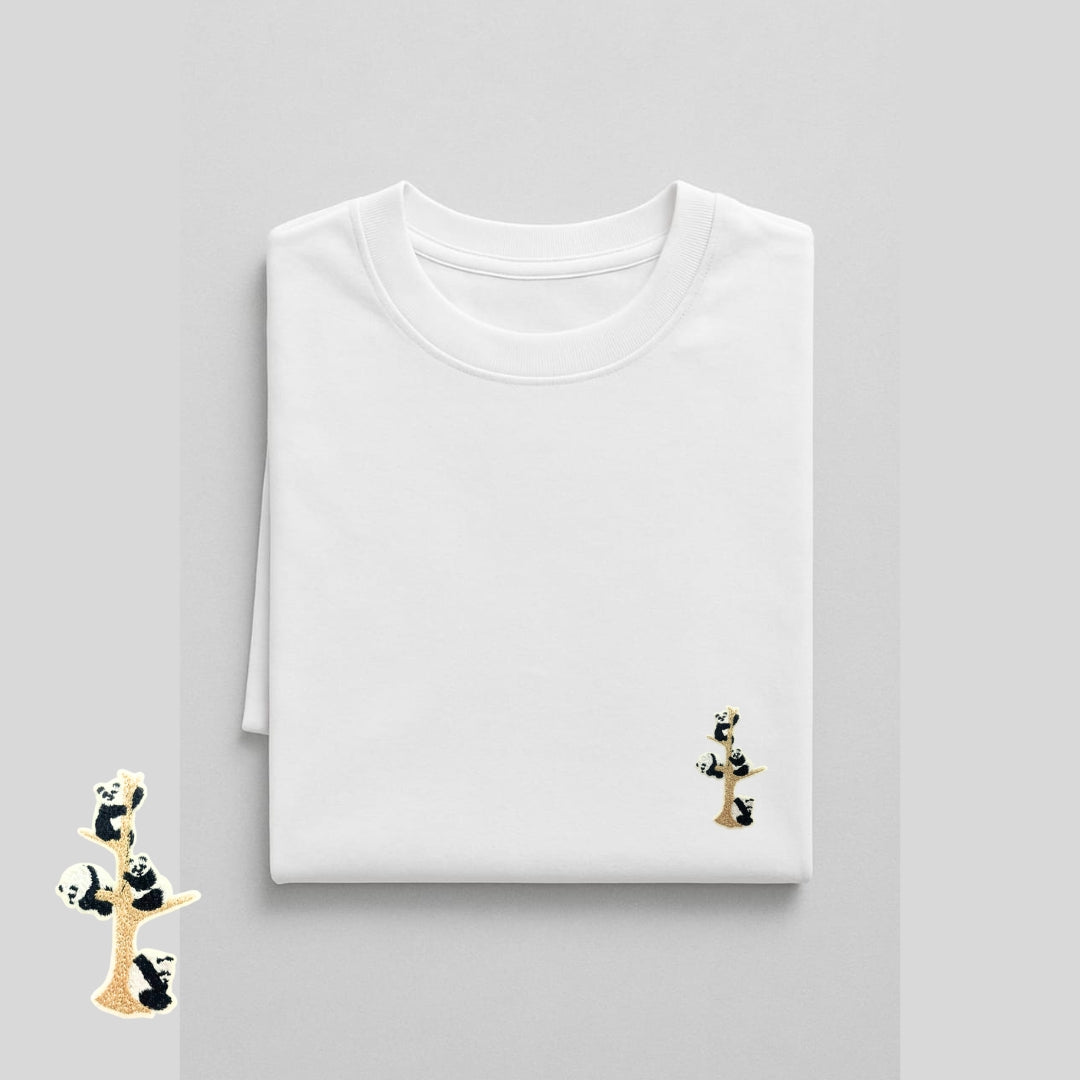 white and black oversized t-shirt, panda embroidery t-shirt, drop shoulder tee, unisex cotton t-shirt, cute graphic t-shirt, streetwear t-shirt, casual oversized t-shirt, embroidered panda tee, summer cotton t-shirt, trendy unisex t-shirt